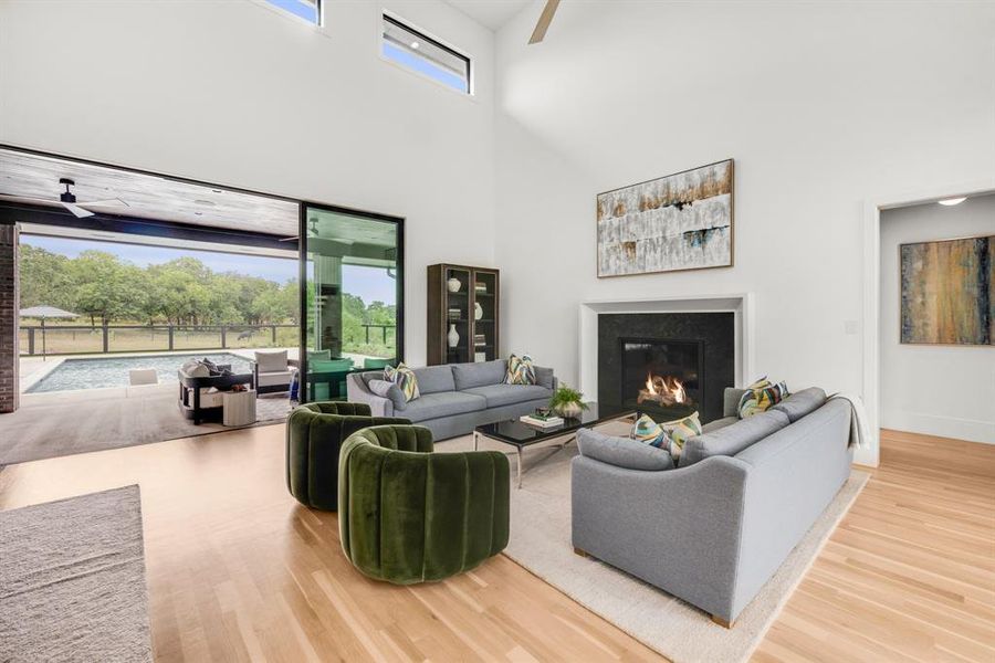 The home is built to seamlessly connect indoor and outdoor living. The custom-built home features a living area that opens up directly onto the property’s large outdoor patio. There’s no need to leave the comfort of home to enjoy the great outdoors.