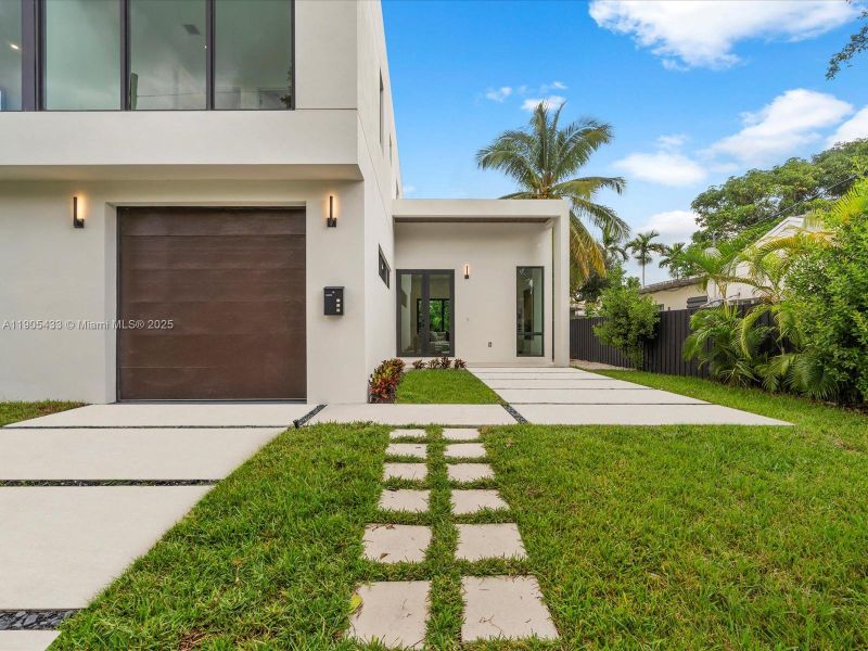 Exterior details and patio area of a home in , Miami (Image 1).