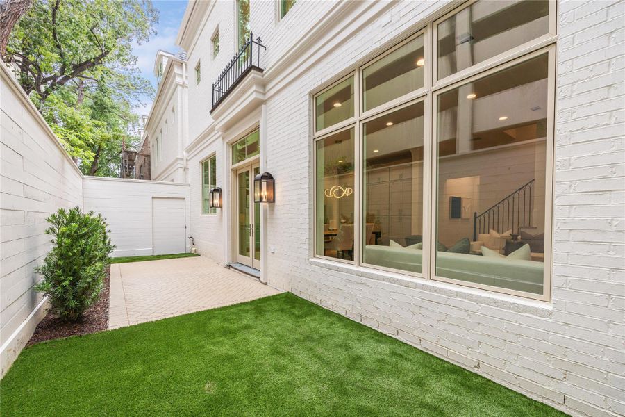 The residence features a slab-on grade foundation, a comprehensive framing and truss plan that meets all relevant codes and windstorm requirements, as well as borate termite treatment. Additionally, it features CertainTeed Landmark Series shingle composition roof, 6" half-round gutters with round downspouts, and Pella Lifestyle Series exceptionally energy-efficient E-rated windows. *Photo is of another home in the community and for informational purposes only. The residence features a slab-on grade foundation, a comprehensive framing and truss plan that meets all relevant codes and windstorm requirements, as well as borate termite treatment. Additionally, it features CertainTeed Landmark Series shingle composition roof, 6" half-round gutters with round downspouts, and Pella Lifestyle Series exceptionally energy-efficient E-rated windows. *Photo is of another home in the community and for informational purposes only.