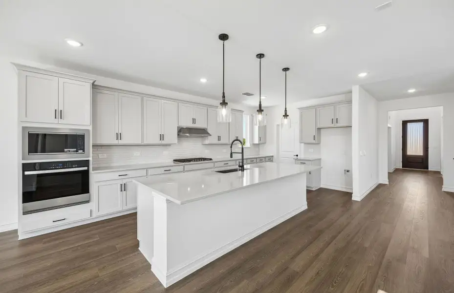 Furnished interior view inside a new home in Highland Lakes, McKinney (Image 7).