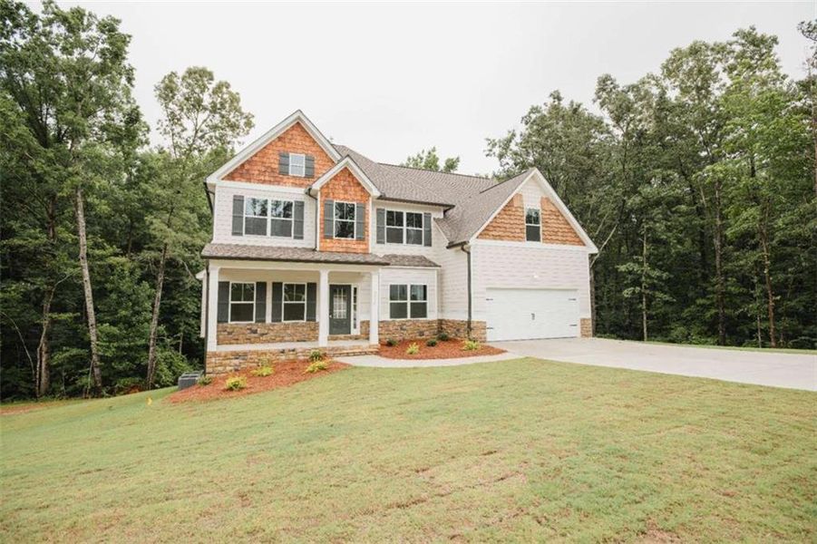 Front exterior of a new home in , Douglasville, GA, highlighting curb appeal (Image 29). Front exterior of a new home in , Douglasville, GA, highlighting curb appeal (Image 29).