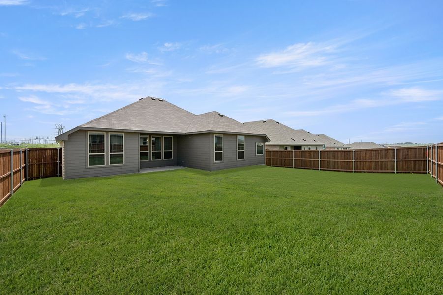 Front exterior of a new home in Still Water Lake Estates, Godley, TX, highlighting curb appeal (Image 27).