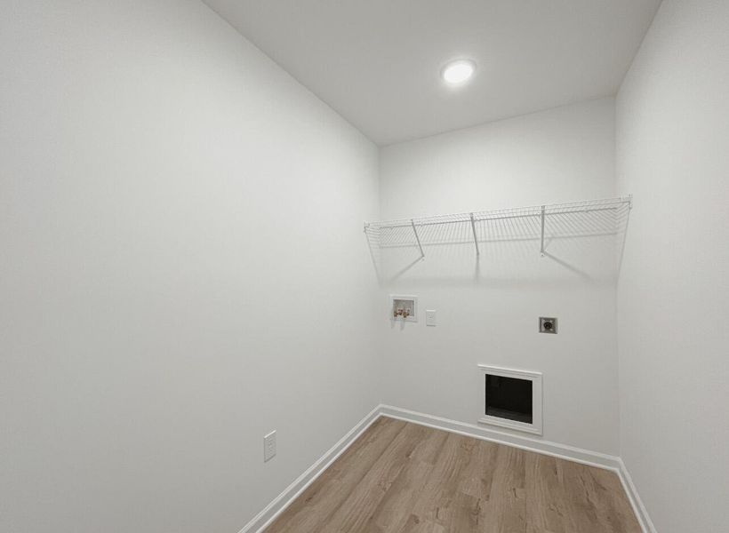 Spacious, unfurnished interior of a new home in East Main Townes, Spartanburg (Image 19).