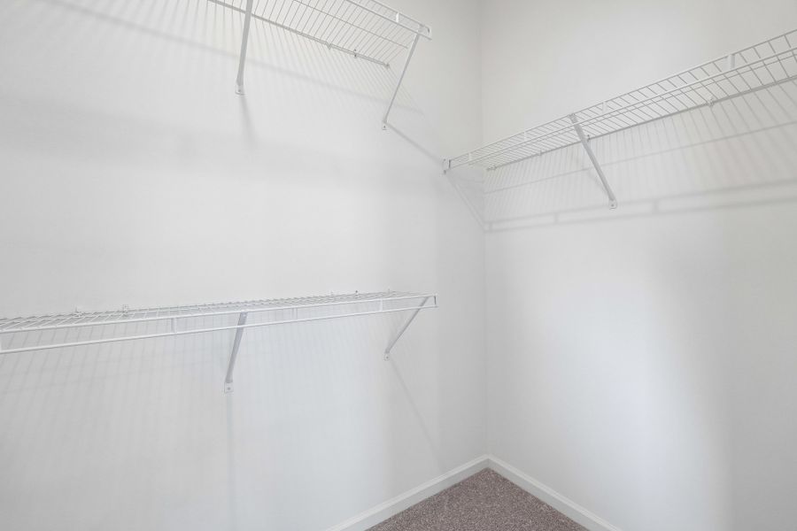 Spacious, unfurnished interior of a new home in Terraces at the Exchange, Indian Land (Image 41).