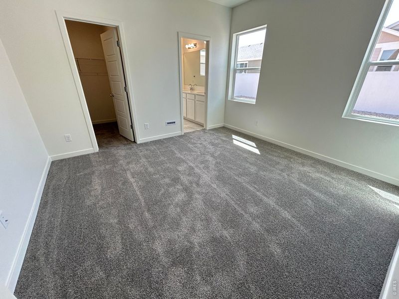 Spacious, unfurnished interior of a new home in Union Colony West, Greeley (Image 9).