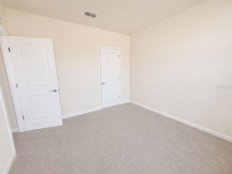 Spacious, unfurnished interior of a new home in Winding Meadows, Apopka (Image 21).