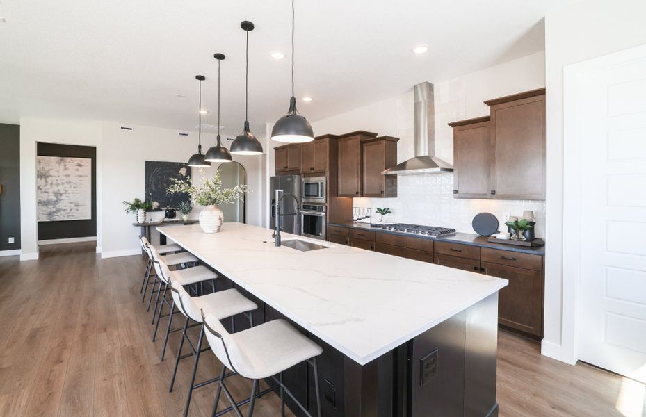Furnished interior view inside a new home in Hilltop at Inspiration, Aurora (Image 17).
