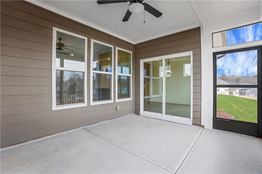 Exterior details and patio area of a home in Twin Lakes, Hoschton (Image 24).