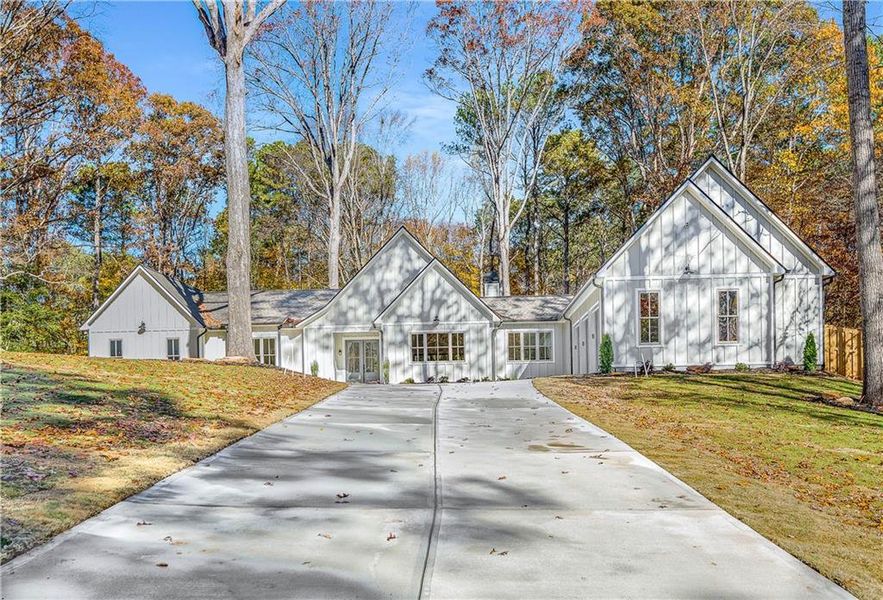 Front exterior of a new home in , Tucker, GA, highlighting curb appeal (Image 1).