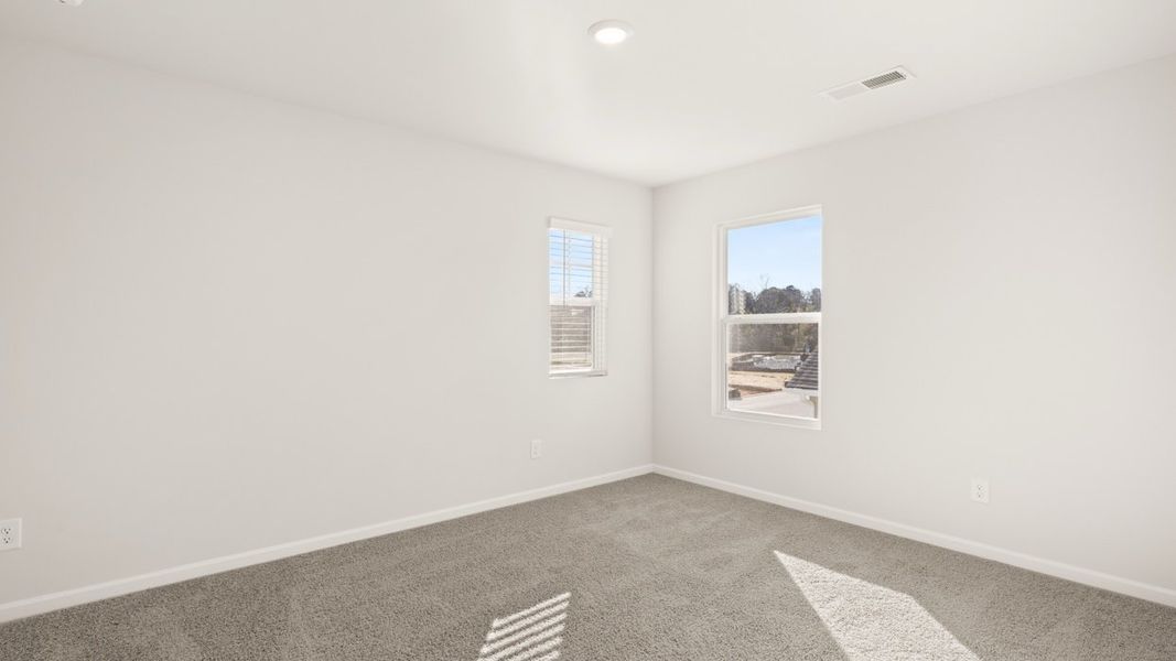 Spacious, unfurnished interior of a new home in The Preserve at Agricultural Village, Perry (Image 24).