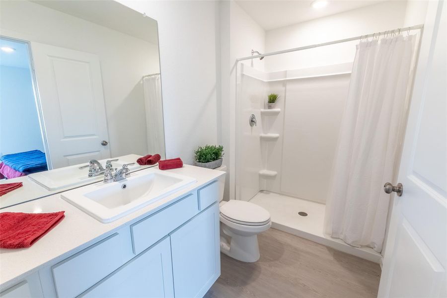 Enjoy the luxury of a private en suite bathroom that offers an over-sized walk-in shower for a spa-like experience. Enjoy the luxury of a private en suite bathroom that offers an over-sized walk-in shower for a spa-like experience.