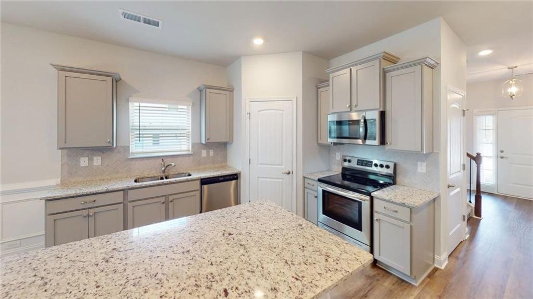 Furnished interior view inside a new home in Mirror Lake at South Harbour, Villa Rica (Image 8).