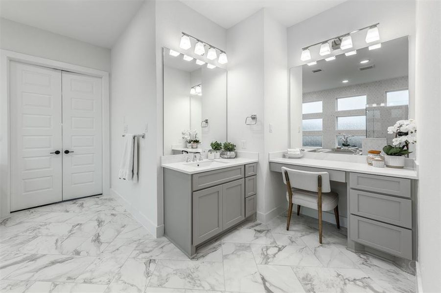 One of my favorite bathroom designs- this second sink space is a convenient and private area for the homeowner to ready for the day.  Plenty of storage.