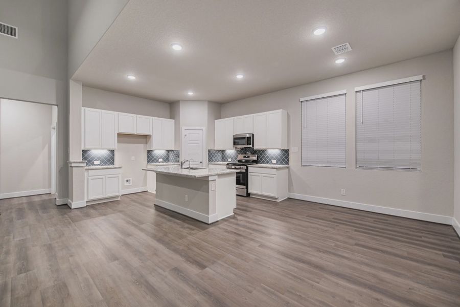 Representative furnished interior of a home built from the Sterling by Chesmar Homes in Buffalo Crossing, Cibolo (Image 4).