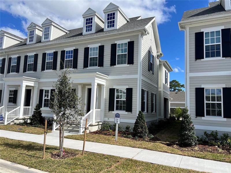 Front exterior of a new home in Celebration, Celebration, FL, highlighting curb appeal (Image 2).