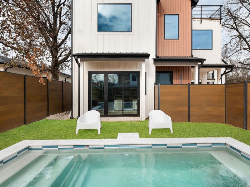 Back of property with board and batten siding