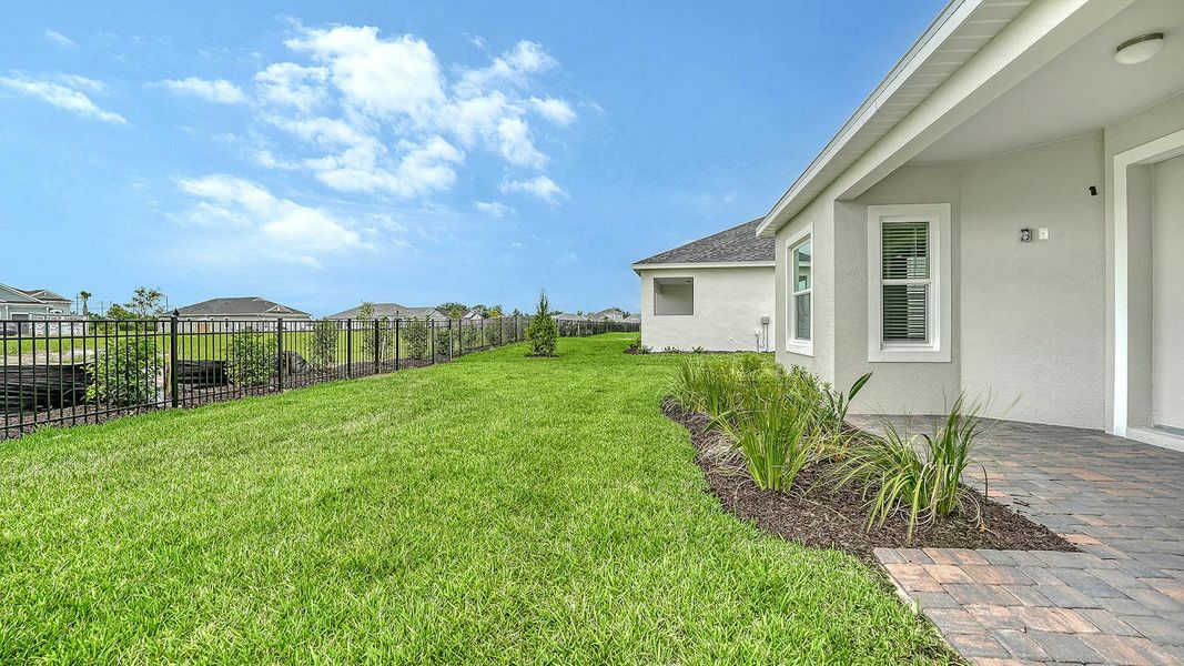 Exterior details and patio area of a home in Wildleaf Real Estate and Homes for Sale in Parrish, FL - Neal Communities, Parrish (Image 21).