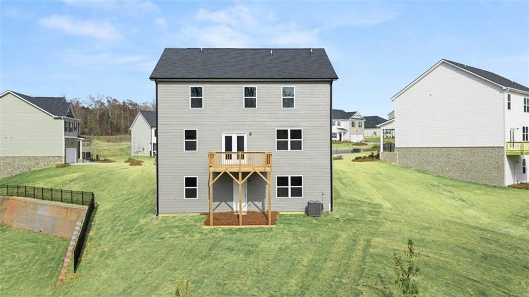 Exterior details and patio area of a home in Locust Grove Station - Cedar Ridge, Locust Grove (Image 19).