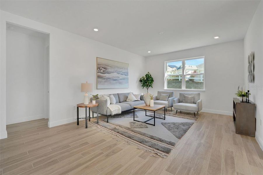 Furnished interior view inside a new home in Green Key Village, Lady Lake (Image 18).