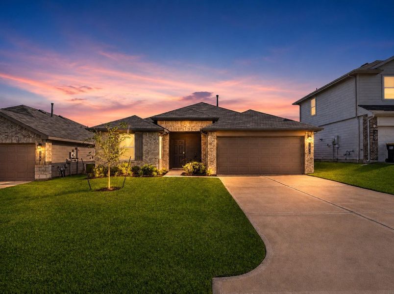 Front exterior of a new home in Summerwood Trails, Willis, TX, highlighting curb appeal (Image 26). Front exterior of a new home in Summerwood Trails, Willis, TX, highlighting curb appeal (Image 26).