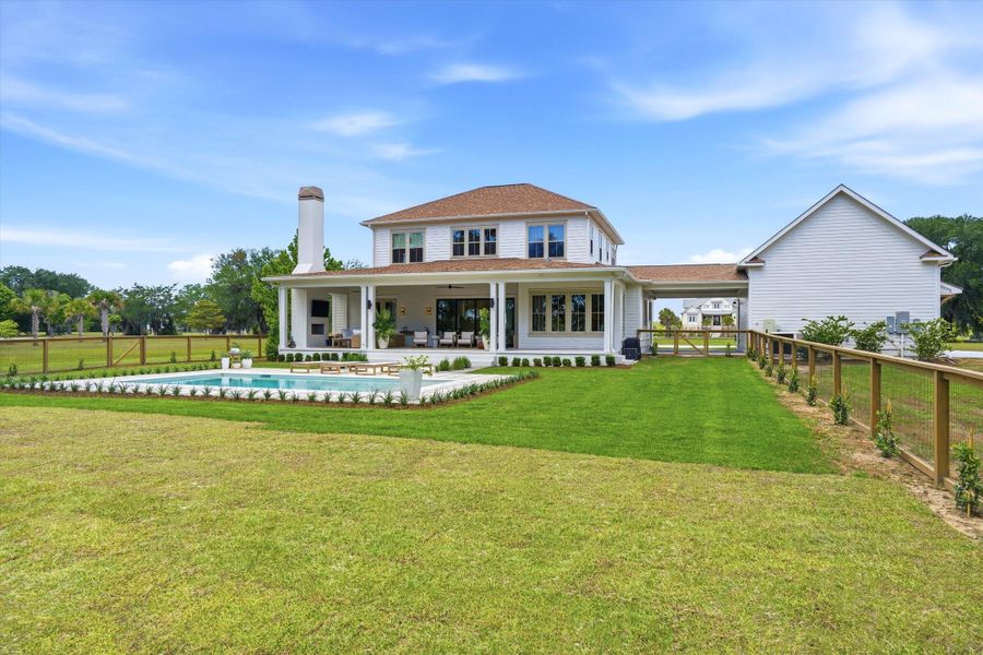 Exterior details and patio area of a home in , Wadmalaw Island (Image 27).