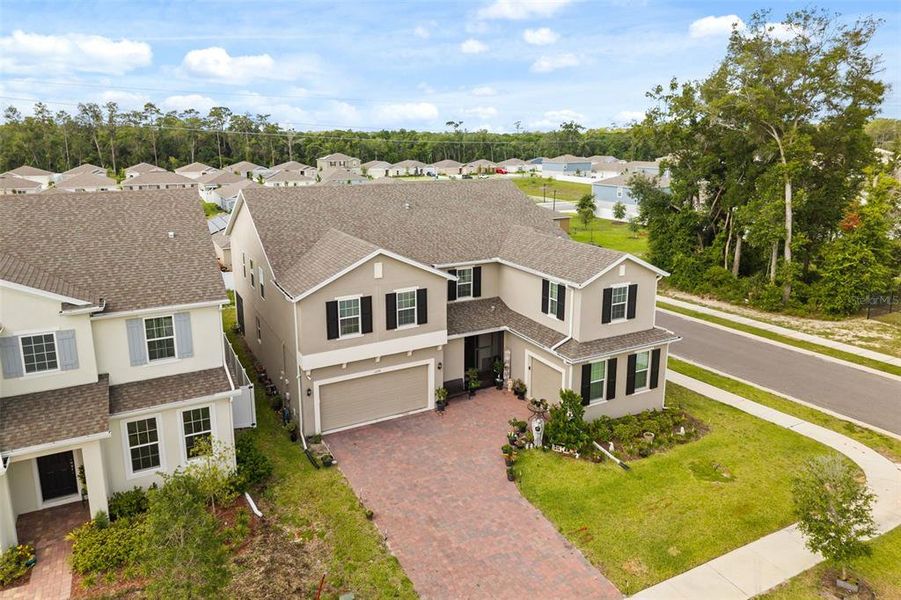 Front exterior of a new home in Beresford Woods, Deland, FL, highlighting curb appeal (Image 23). Front exterior of a new home in Beresford Woods, Deland, FL, highlighting curb appeal (Image 23).