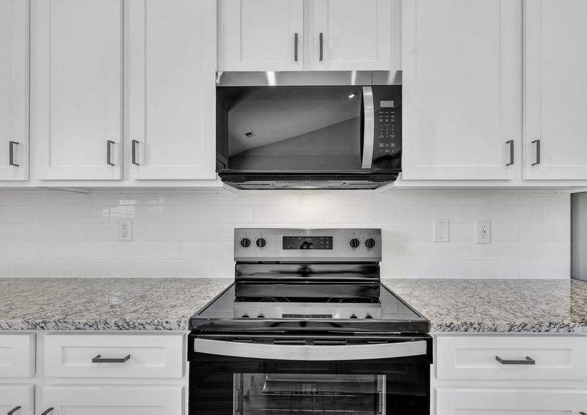 The kitchen has granite countertops.