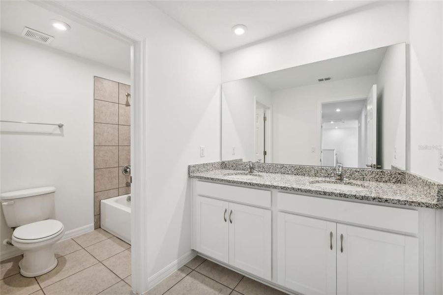 Furnished interior view inside a new home in Groves at Grand Island, Grand Island (Image 16). Furnished interior view inside a new home in Groves at Grand Island, Grand Island (Image 16).