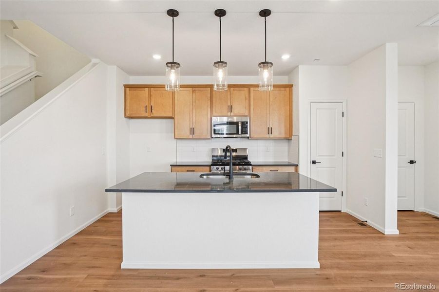 Furnished interior view inside a new home in The Nest Villas at Canyon Creek, Erie (Image 3).