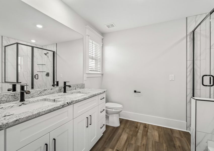 The master bath includes a walk-in shower.