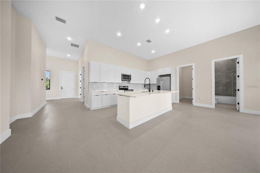 Furnished interior view inside a new home in , Port Charlotte (Image 11). Furnished interior view inside a new home in , Port Charlotte (Image 11).