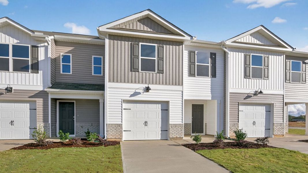 Representative exterior photo of a completed home built from the MITCHELL by D.R. Horton in The Townes at Honeycutt Oaks, Angier, NC (Image 20).