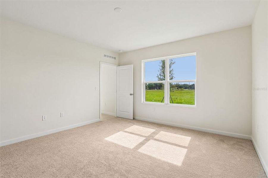 Spacious, unfurnished interior of a new home in Liberty Trace, Haines City (Image 26).