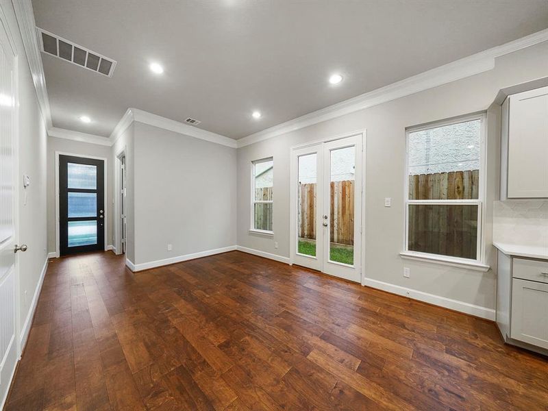 Host holiday dinners in the spacious dining area! The wood flooring in the dining area is part of our Standard Features. (Sample photo of a completed Sterling Floor Plan. Image may show alternative features/and or upgrades.)