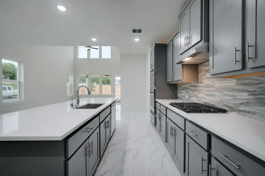 Representative furnished interior of a home built from the Travis by Scott Felder Homes in Flora, Hutto (Image 7).