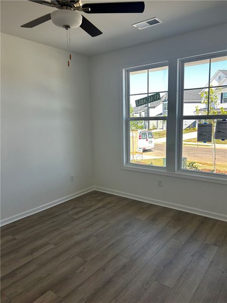 This bright room features wide windows and durable