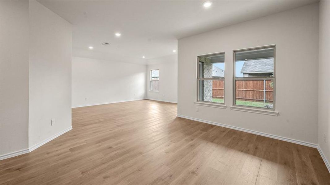Spare room with recessed lighting and light wood-style flooring