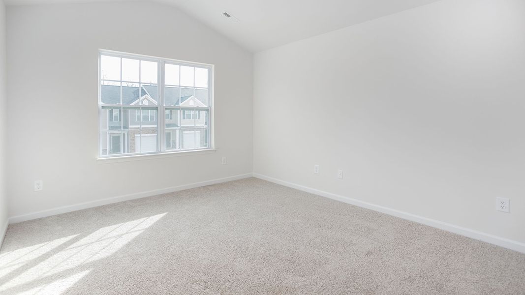 Spacious, unfurnished interior of a new home in The Gables at Edinborough Townes, Gibsonville (Image 14).