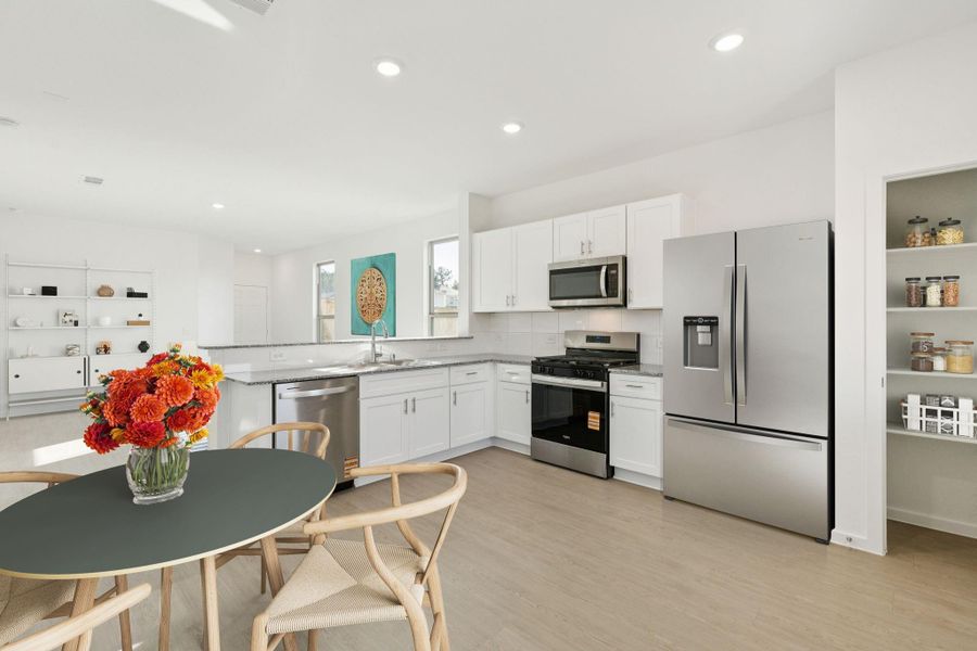 Furnished interior view inside a new home in Mavera, Conroe (Image 11).