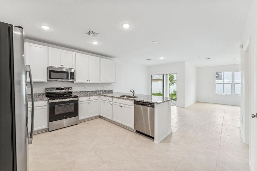 Kitchen, Great Room & Dining Area