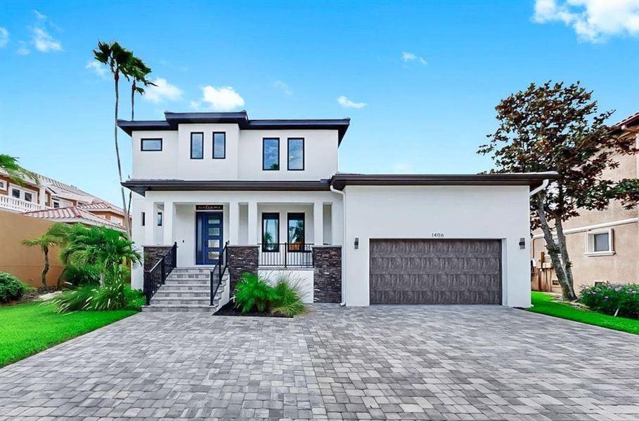 Front exterior of a new home in , Apollo Beach, FL, highlighting curb appeal (Image 23).