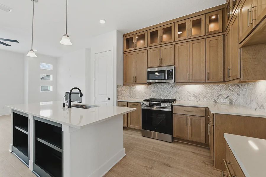 Furnished interior view inside a new home in Centero at Stone Oak, San Antonio (Image 6).