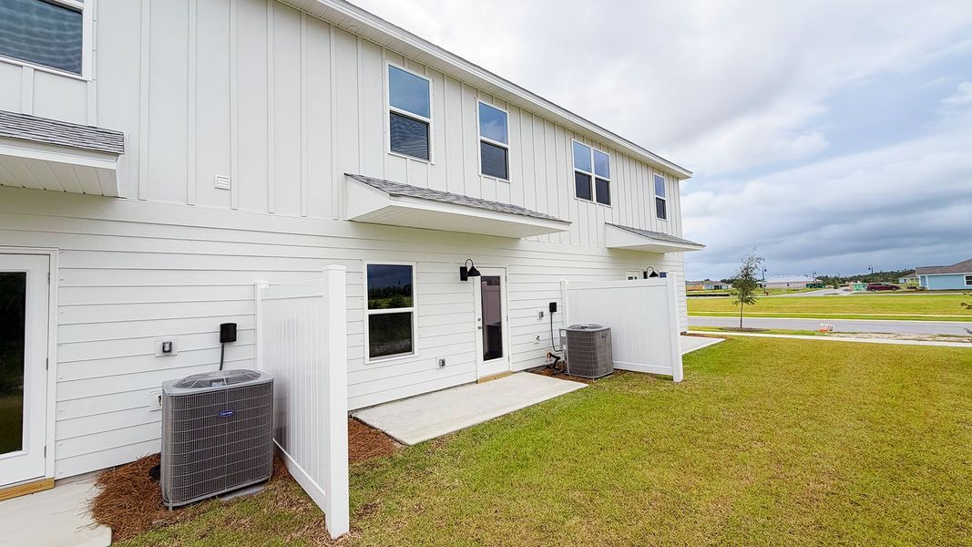 Exterior details and patio area of a home in Salt Creek Townhomes at Mexico Beach, Mexico Beach (Image 22). Exterior details and patio area of a home in Salt Creek Townhomes at Mexico Beach, Mexico Beach (Image 22).