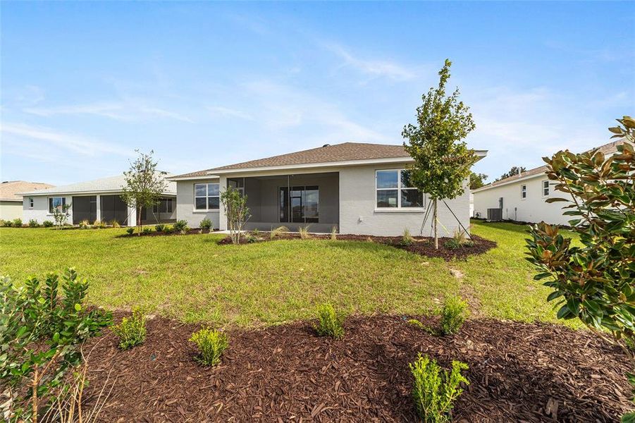 Exterior details and patio area of a home in On Top of the World Communities, Ocala (Image 4).