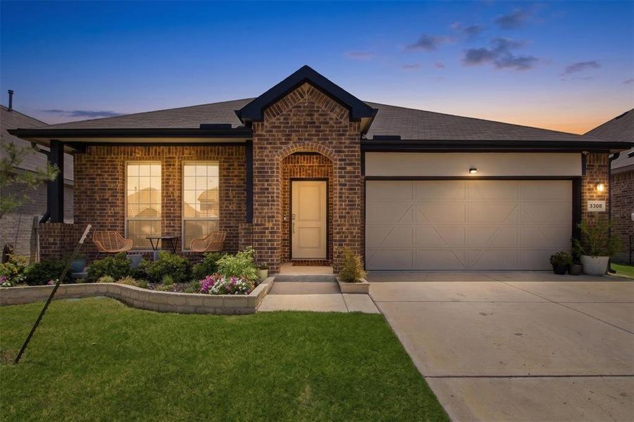 Front exterior of a new home in Kings Ridge, Denton, TX, highlighting curb appeal (Image 1). Front exterior of a new home in Kings Ridge, Denton, TX, highlighting curb appeal (Image 1).