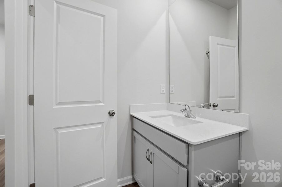 Furnished interior view inside a new home in Waxhaw Landing, Monroe (Image 16).