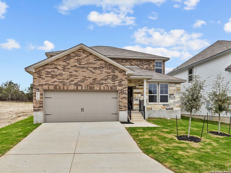 Front exterior of a new home in Royal Crest, San Antonio, TX, highlighting curb appeal (Image 2).