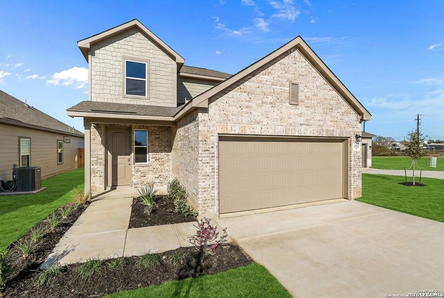 Front exterior of a new home in Garden Grove, San Antonio, TX, highlighting curb appeal (Image 21).
