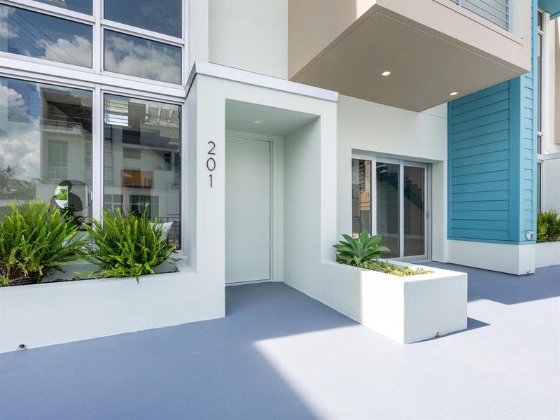 Front exterior of a new home in , Sarasota, FL, highlighting curb appeal (Image 31).