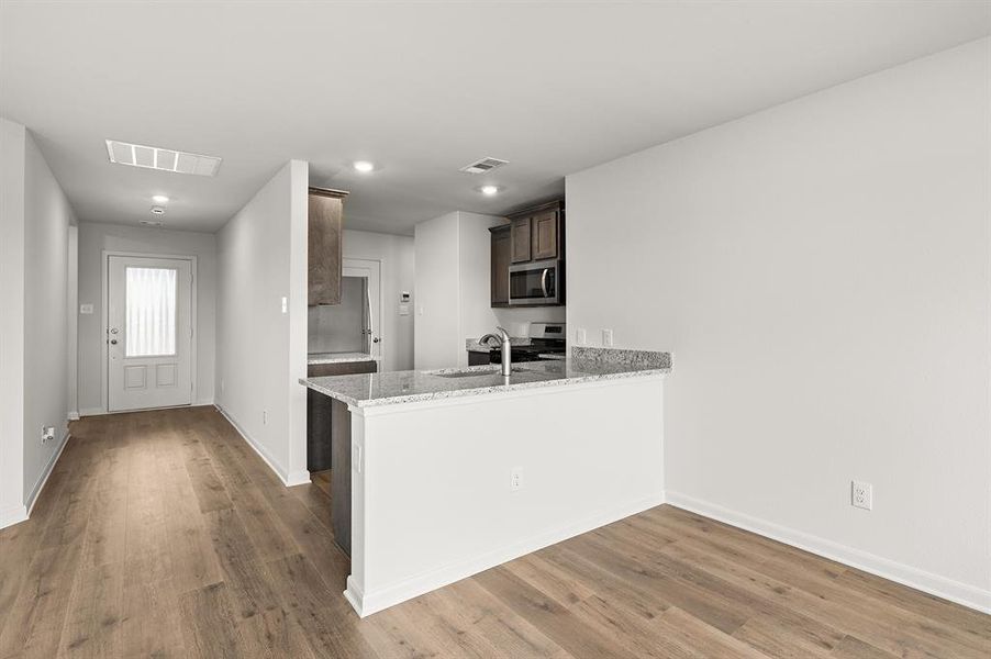 Furnished interior view inside a new home in Patriot Estates, Venus (Image 4).